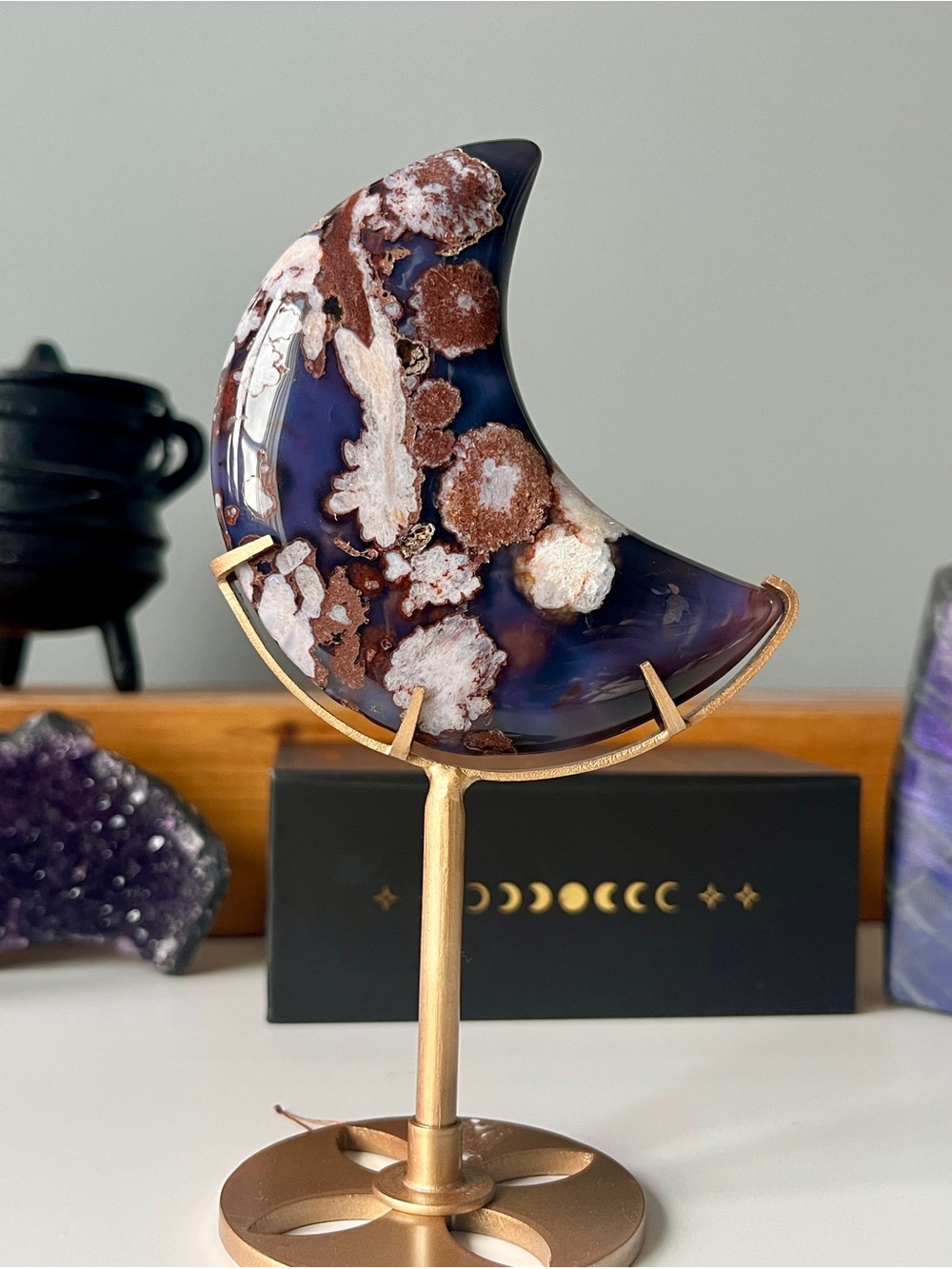 Deep blue flower agate moon on stand